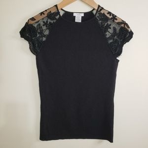 Caché black top with lace sleeves